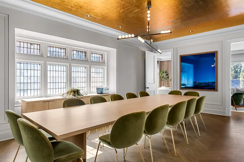 Dining room under a gold-leaf ceiling