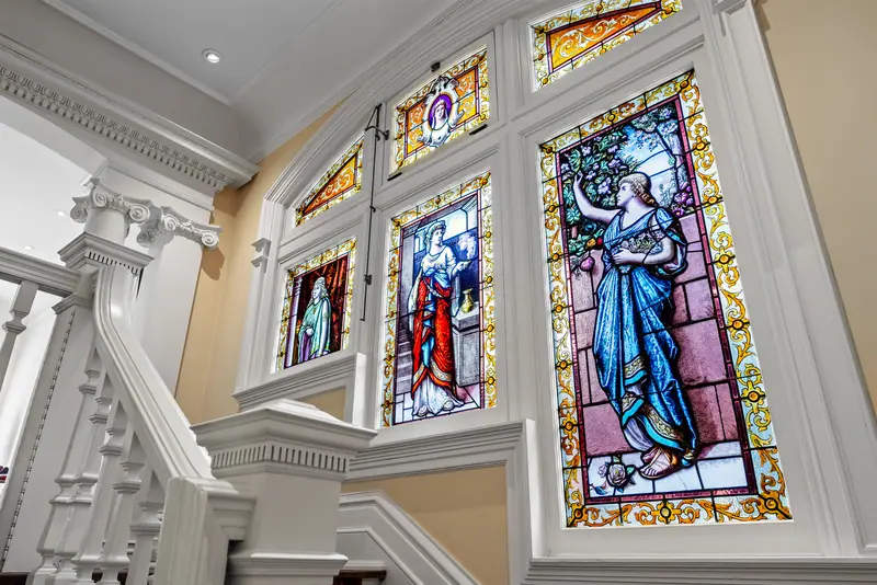 Stained-glass windows over the main staircase