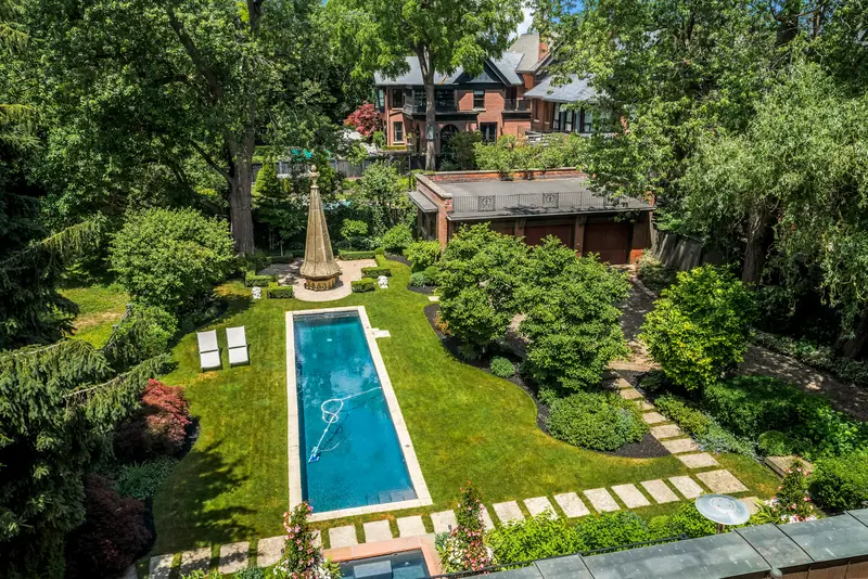 Aerial of the garden, lap pool and gardens behind the house