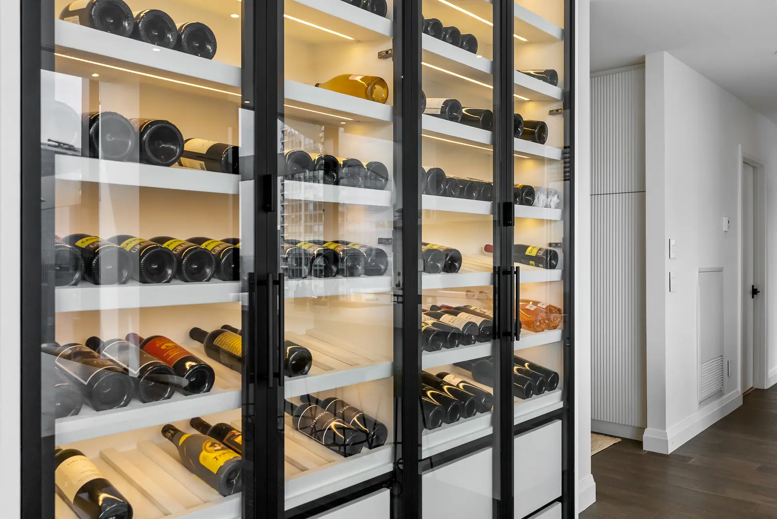 Glass-front wine wall