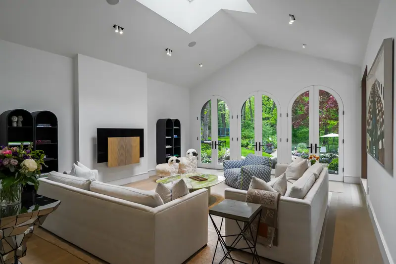 Family room with arched French doors