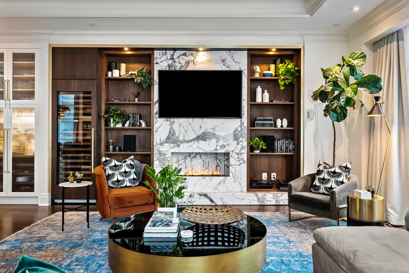 Family room with marble fireplace and city views