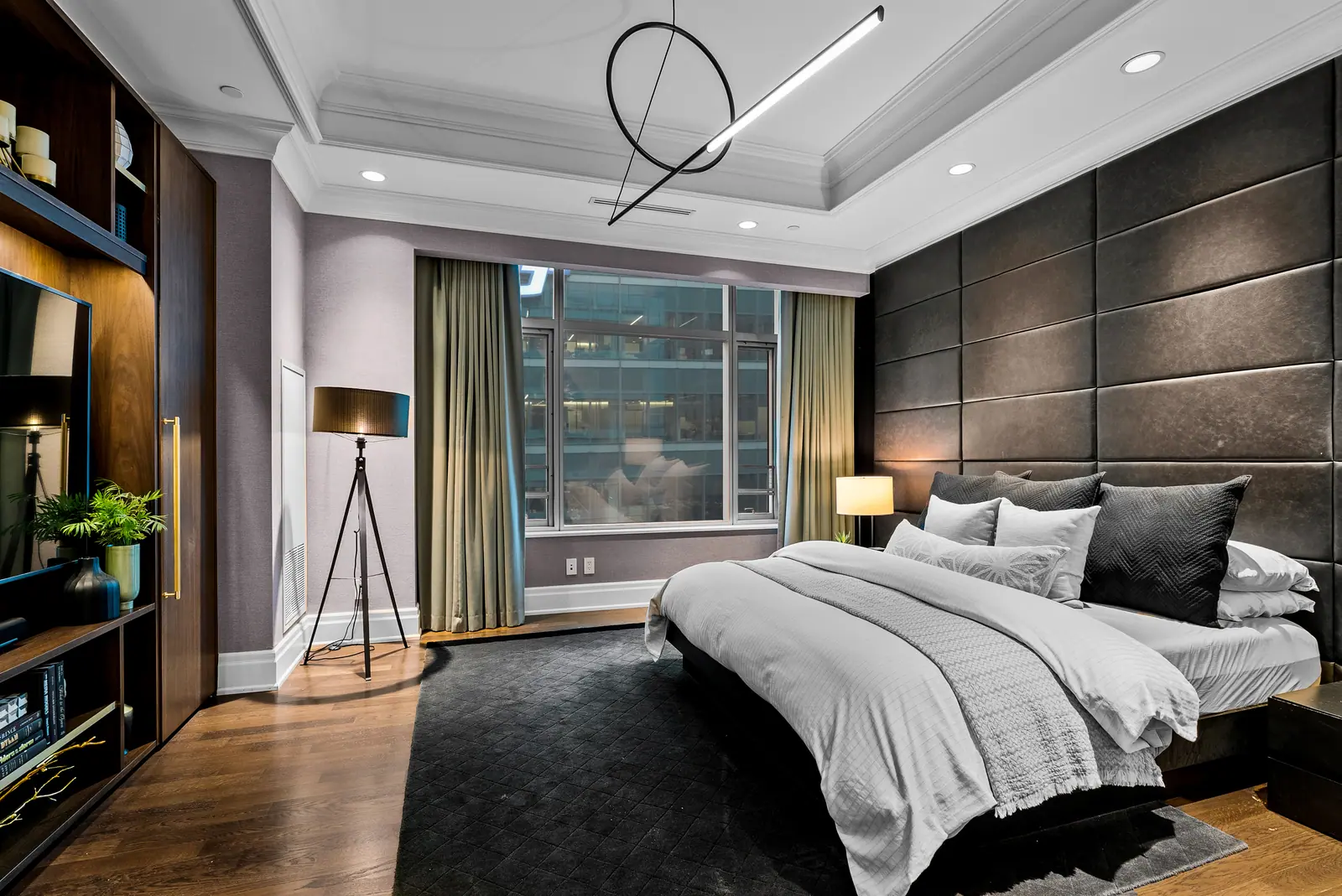 Primary bedroom with padded leather wall
