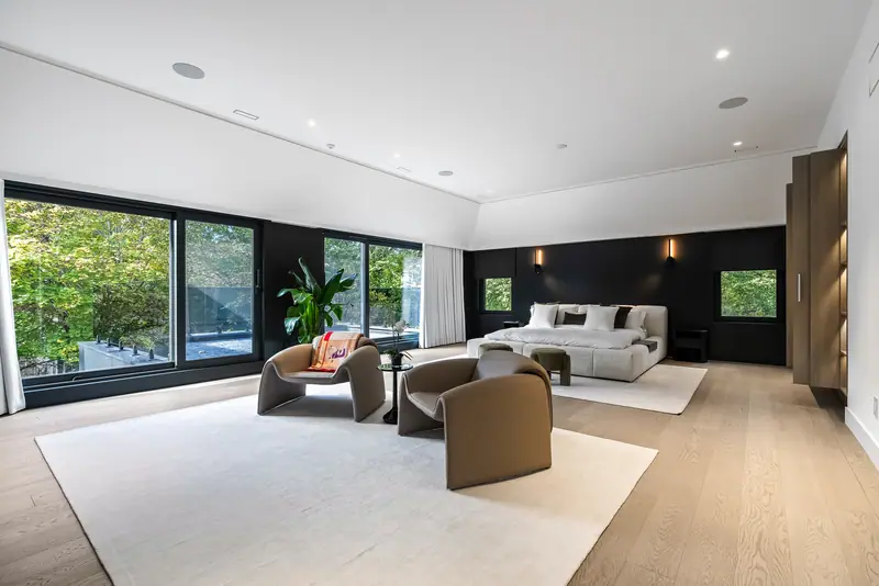 Primary suite with sitting area and garden windows